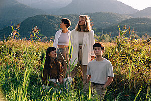 The band The Komets standing in a field